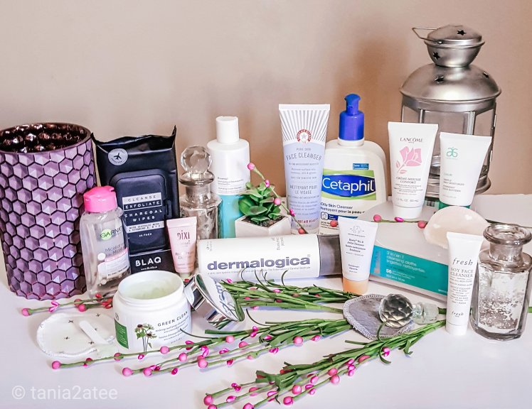 Image of variety of face cleansers and vases