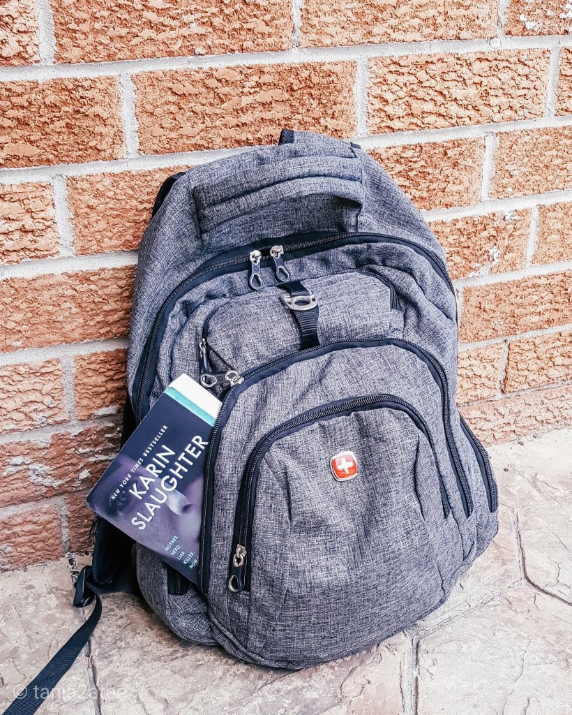 Backpack with book sticking out