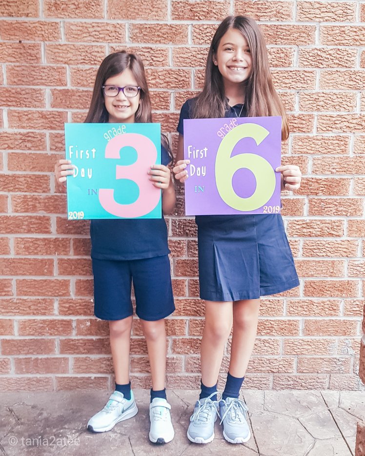 tania2atee-blog-first-day-of-grade-three-and-six-girls-outside-with-signs526923739.jpg